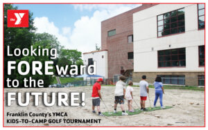 local kids playing golf in the y's newly demolished lot